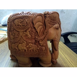 intricately hand-carved wooden elephant statue