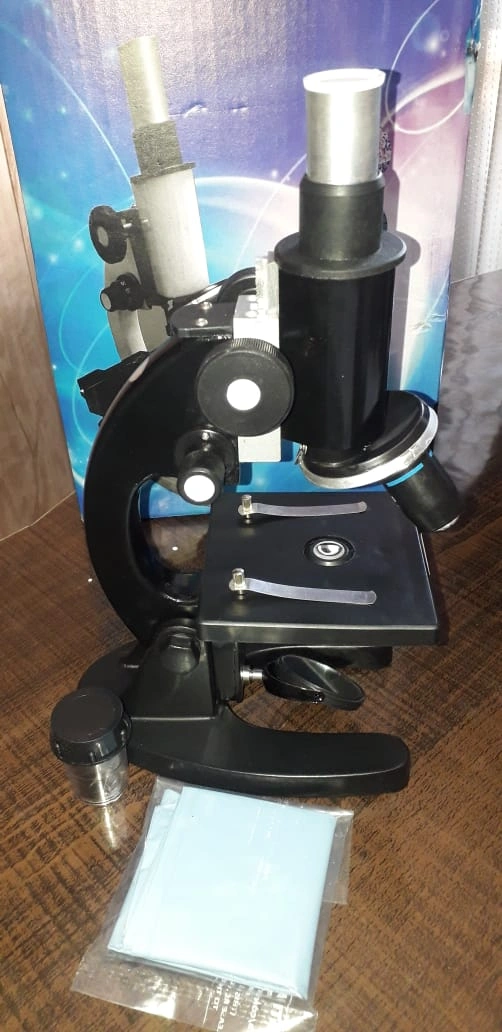 compound student microscope-12610892