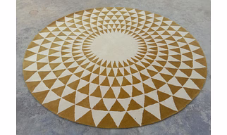 HAND TUFTED