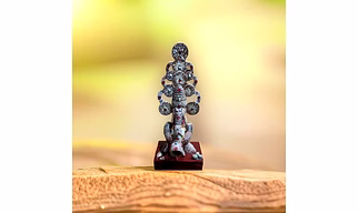 Supaari Ganesha Shehnaayi Mudra Idol SUPAARI Ganesha Shehnaayi Mudra Idol – Handcrafted Betel Nut Statue Celebrating Tradition