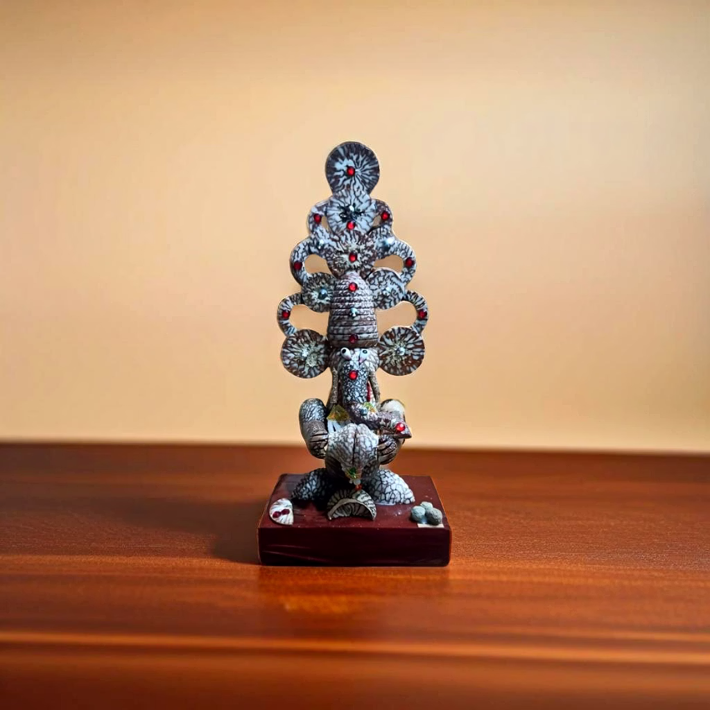 supaari exclusive ganesha dhol mudra idol – artisan betel nut sculpture for spiritual celebrations
