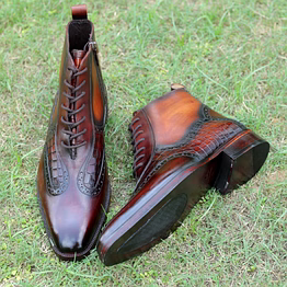 handcrafted luxury leather boots – classic wingtip design with croc embossed detailing