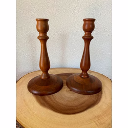 "artisanal wooden candle stand – sturdy base, decorative carvings, ideal for centerpieces"
