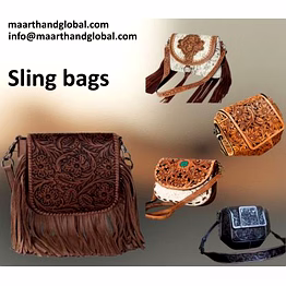 handcrafted genuine leather tooling women’s sling bag with floral embossed flap, fringe detail and adjustable strap