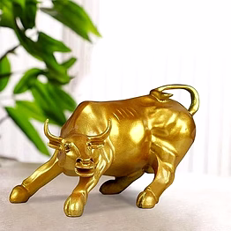 elegant bronze charging bull sculpture