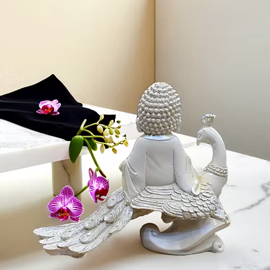 Tranquil Monk on Peacock Figurine-3