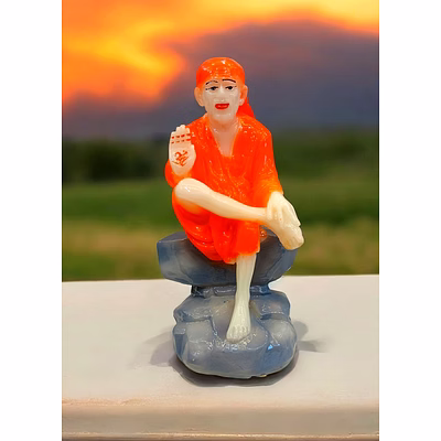 handcrafted marble shirdi sai baba idol sitting on rock | spiritual home decor | vastu-positive showpiece
