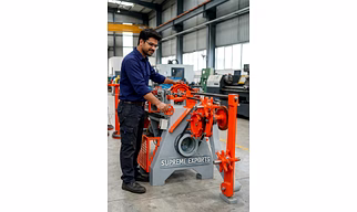 Barbed wire making machine
