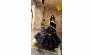 Elegant Bandhani Lehenga Set with Mirror Work Detailing