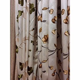 white embroidered floral curtain