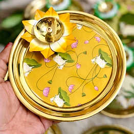 kamadhenu pooja thali with lotus diya