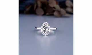 Oval solitaire ring