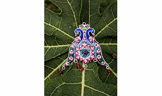 Meenakari brooch
