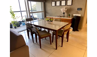 Six seater dining table of teak wood