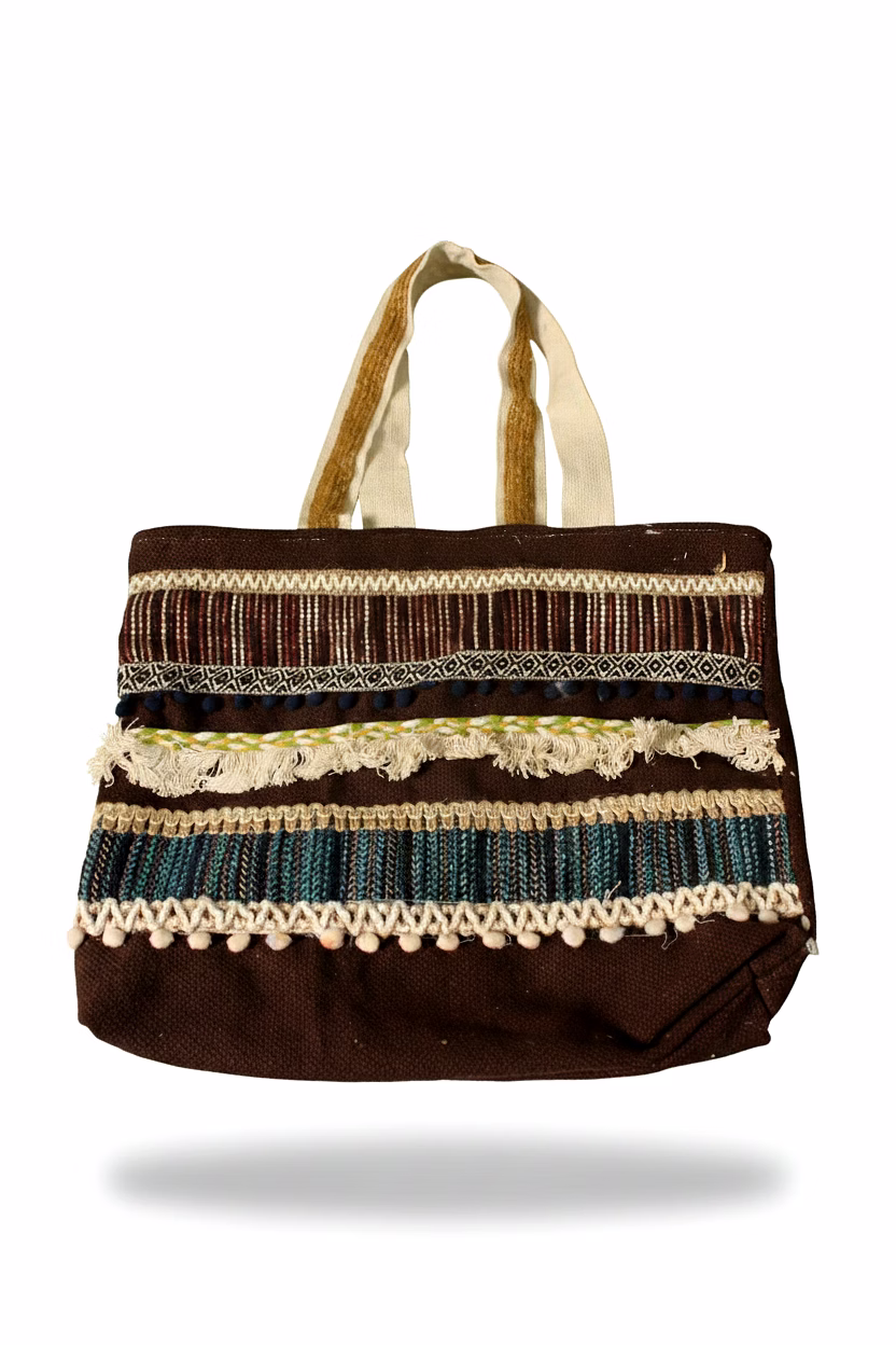 boho-chic artisanal canvas tote bag – hand-woven striped design with pom-pom accents