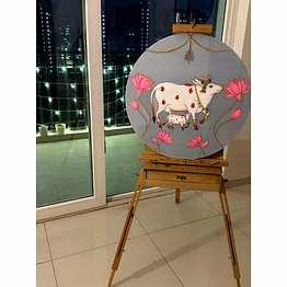 round shaped sacred cow painting