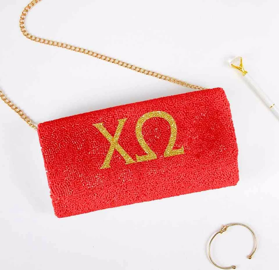 transparent acrylic evening clutch with gold chain exporter