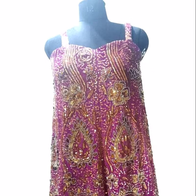 golden hand-beaded maxi dresses for boutique collections