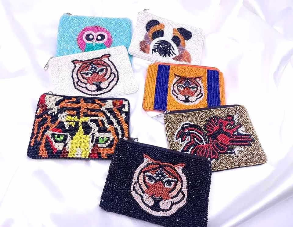 hand-embroidered tiger coin purses for boutique collections