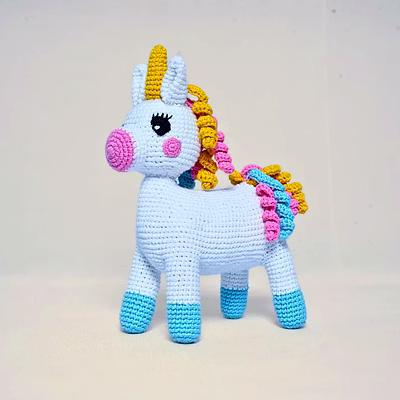 hand‑crocheted multicolor unicorn stuff toy