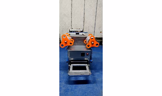 Automatic tray sealing machine