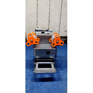 Automatic tray sealing machine