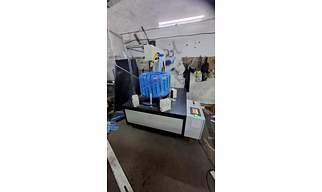 HORIZONTAL COIL STRECH WRAPPING MACHINE