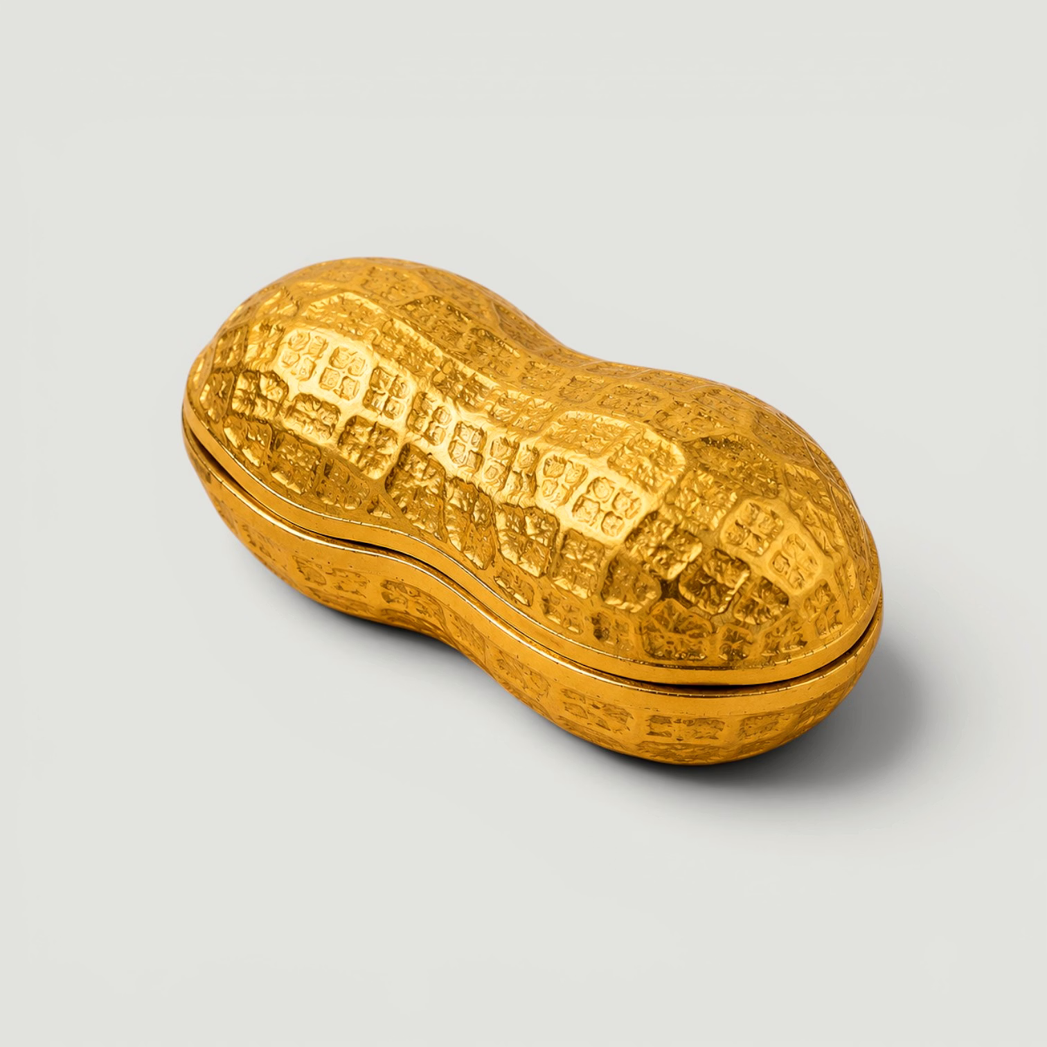 golden peanut shape decorative storage box | metal trinket organizer | luxury tabletop & gift decor accent