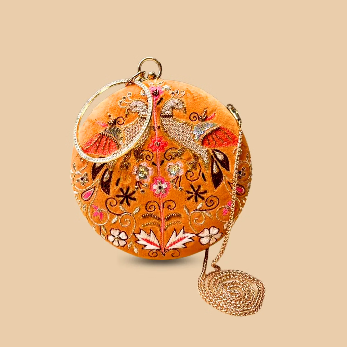royal avian amber orange velvet potli clutch – hand-embroidered peacock purse with crystal ring handle and gold chain