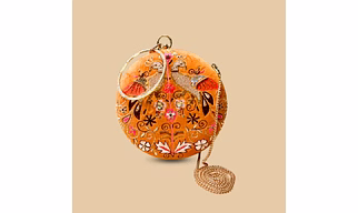 Royal Avian Amber Orange Velvet Potli Clutch – Hand-Embroidered Peacock Purse with Crystal Ring Handle and Gold Chain