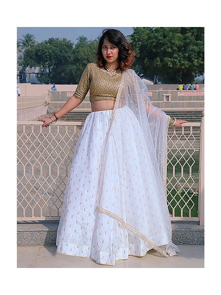 Heavily Embroidered Golden Blouse with Upada Silk White Lehenga with light buttis and with White Net Dupatta.-2