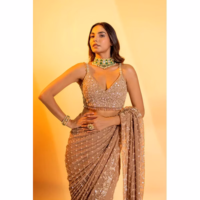 shiv georgette aahana champagne colour saree with tassels