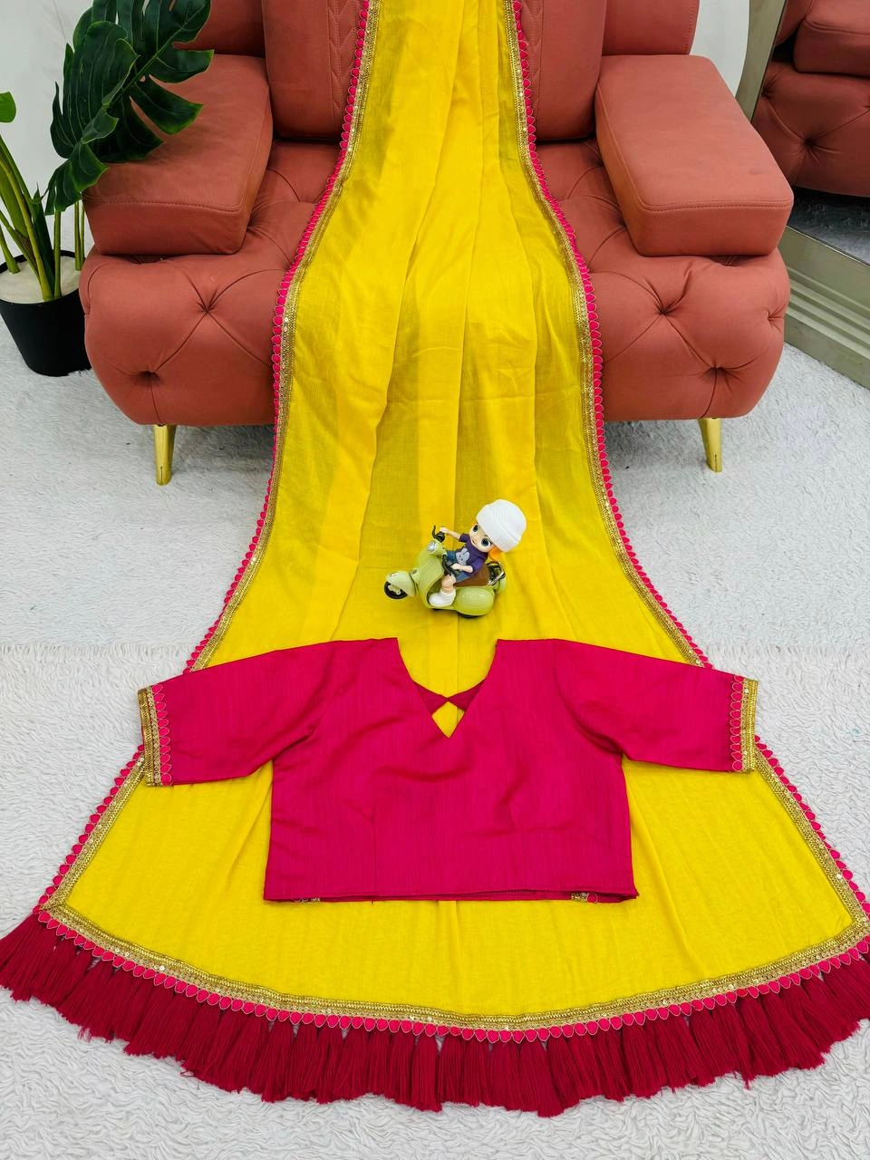 Yellow mul mul cotton sarees with pom pom