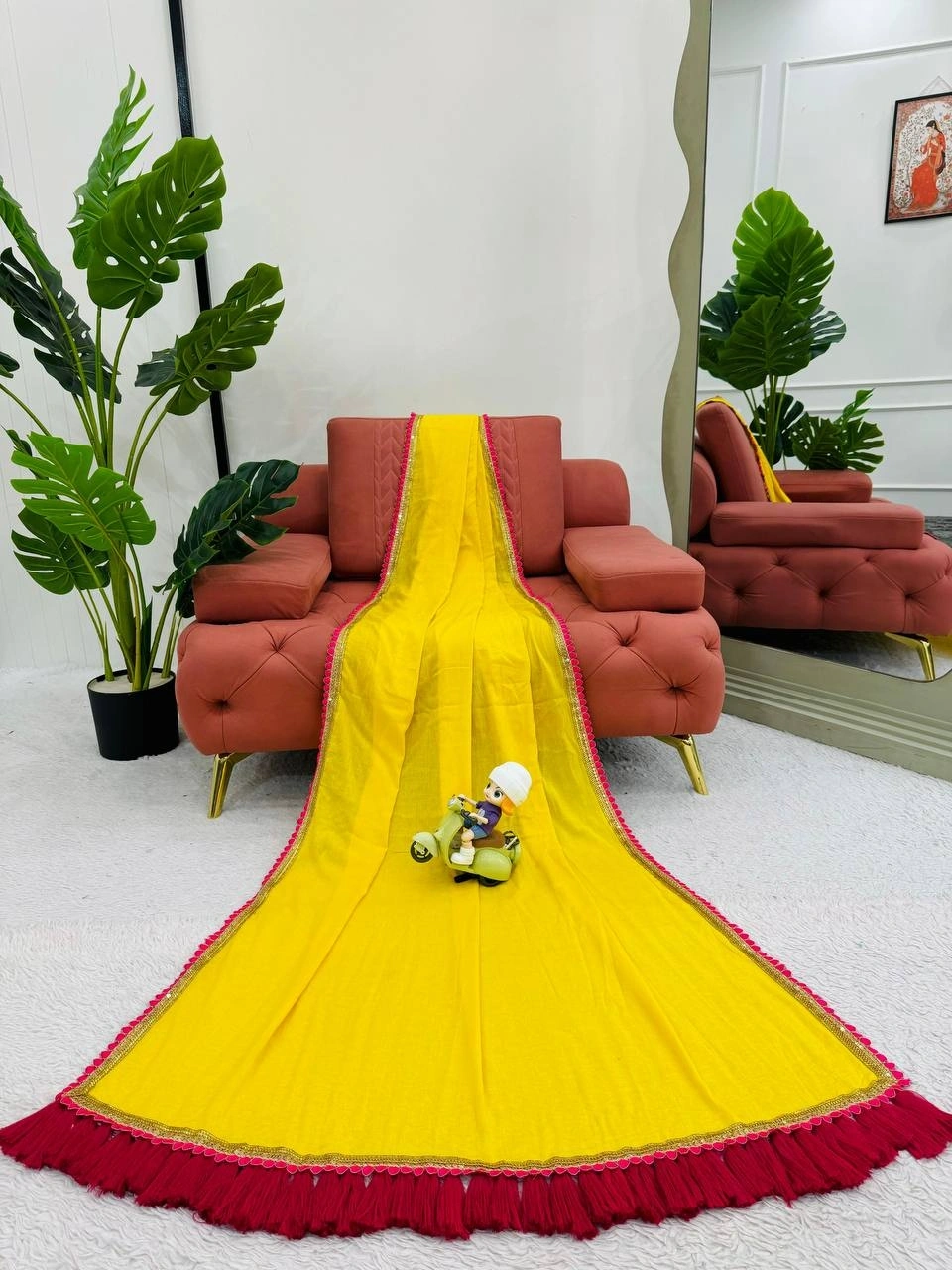 Yellow mul mul cotton sarees with pom pom