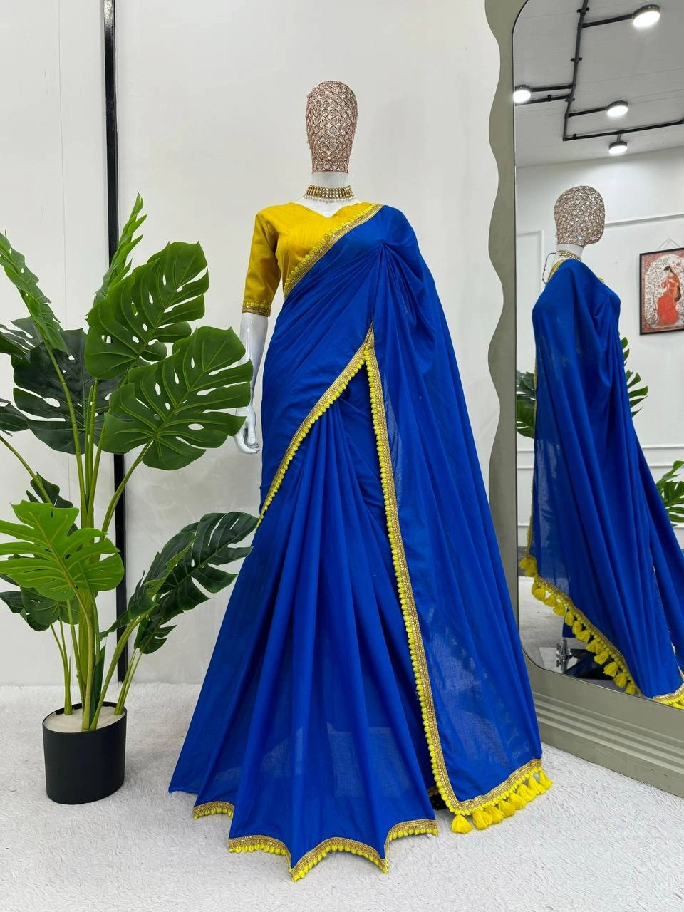 Blue mul mul cotton sarees with pom pom