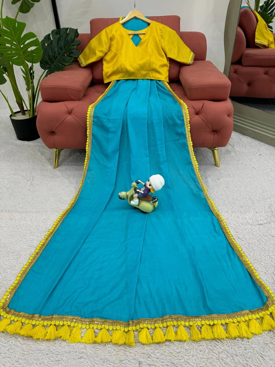 Cyan mul mul cotton sarees with pom pom