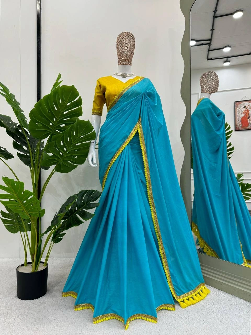 Cyan mul mul cotton sarees with pom pom