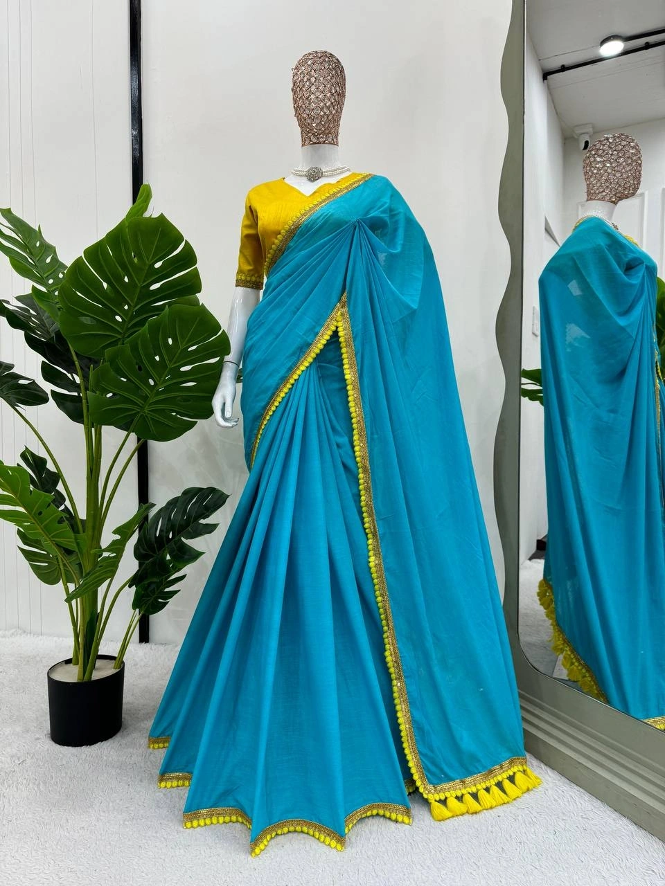 Cyan mul mul cotton sarees with pom pom