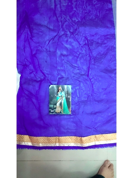 Gorgeous blue embroidered georgette sari with green highlights, accompanied by a blouse, perfect for