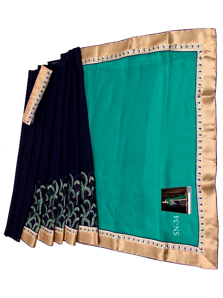Stunning blue georgette sari with green accents and embroidery, paired with a coordinating blouse fo