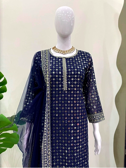 Stylish navy blue suit set in Georgette, embellished with gold embroidery.