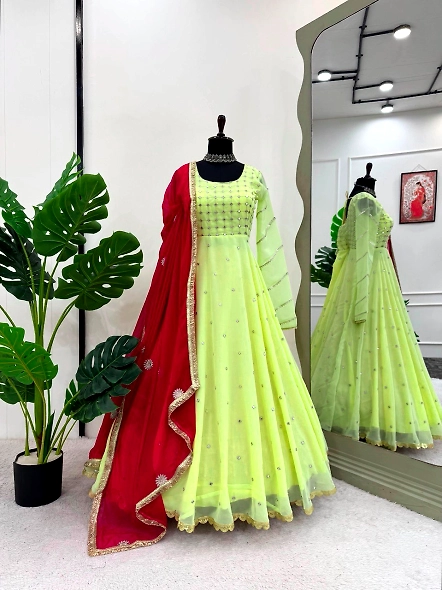 Elegant yellow Georgette anarkali suit set with red accents and detailed embellishments.