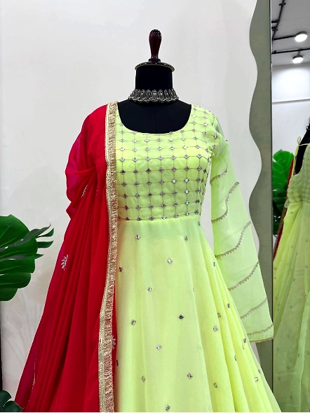 Stylish yellow Georgette anarkali suit with red highlights and exquisite detailing throughout.