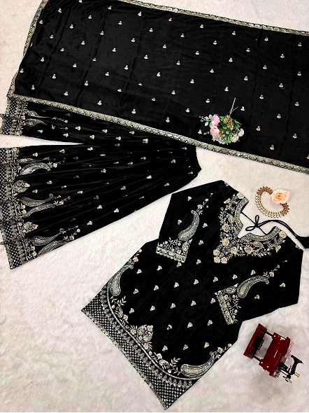 Black Chinon silk lehenga suit with detailed gold embroidery, combining elegance and tradition in on