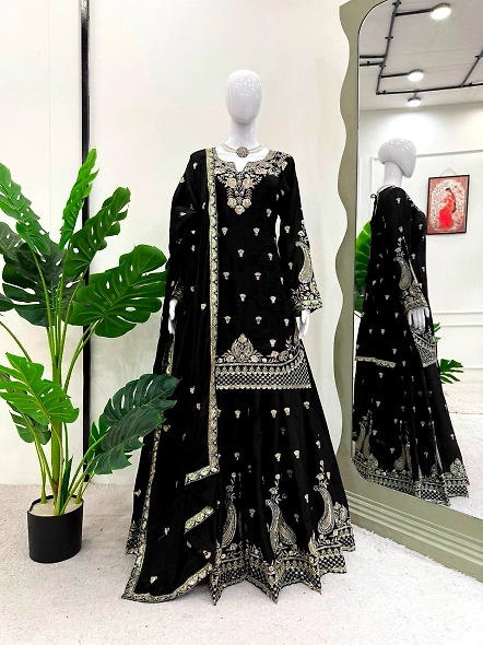 Elegant black embroidered lehenga suit in Chinon silk, featuring stunning gold embroidery for a luxu