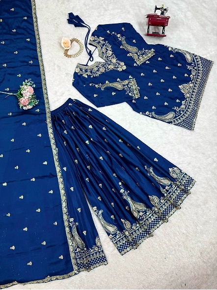 Chic blue anarkali suit made of Chinon silk, embellished with delicate gold embroidery for a stylish