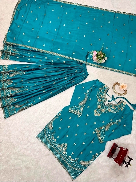 Beautiful cyan suit with gold embroidery, designed in fine brown Chinon silk.