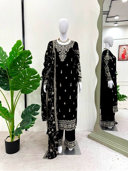 Elegant black embroidered Georgette suit set adorned with gold detailing, perfect for formal occasio