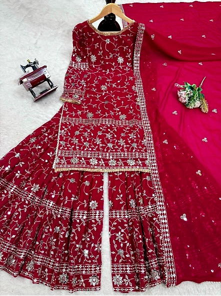 Beautiful maroon lehenga suit set in Georgette, embellished with embroidery and complemented by a ma