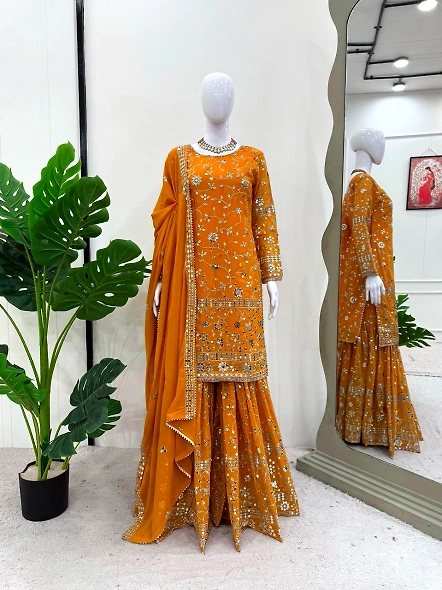 Elegant yellow Georgette lehenga suit with embroidery and a coordinating dupatta, showcasing detaile